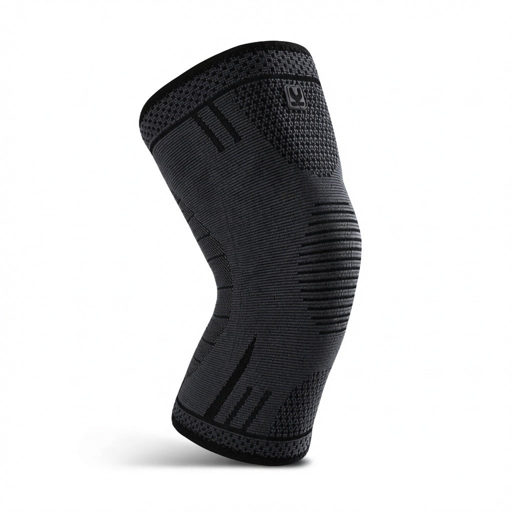 Genouillère de compression FlexoZen noire portée sur genou